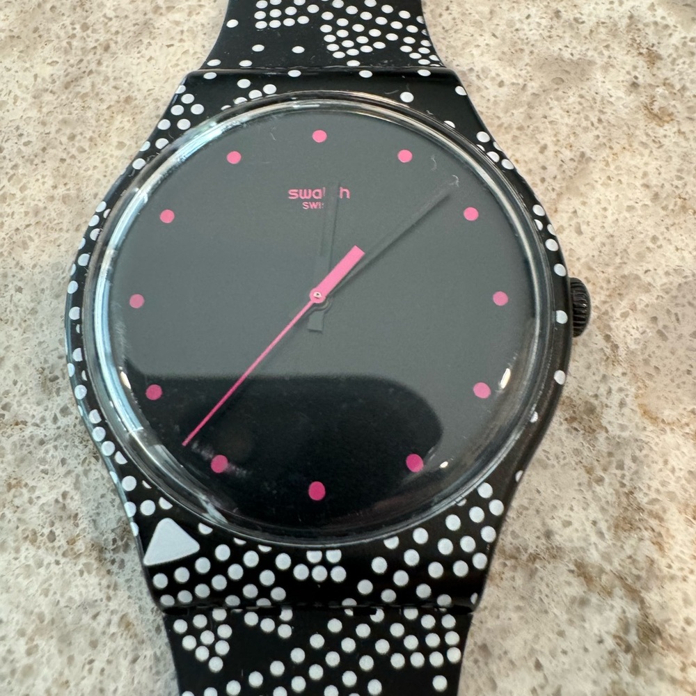SWATCH watch - black patterned band with black watch face & pink hour indicators